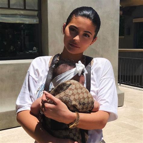 kylie jenner gucci baby carrier|Kylie Jenner dresses Stormi in Gucci baby carrier.